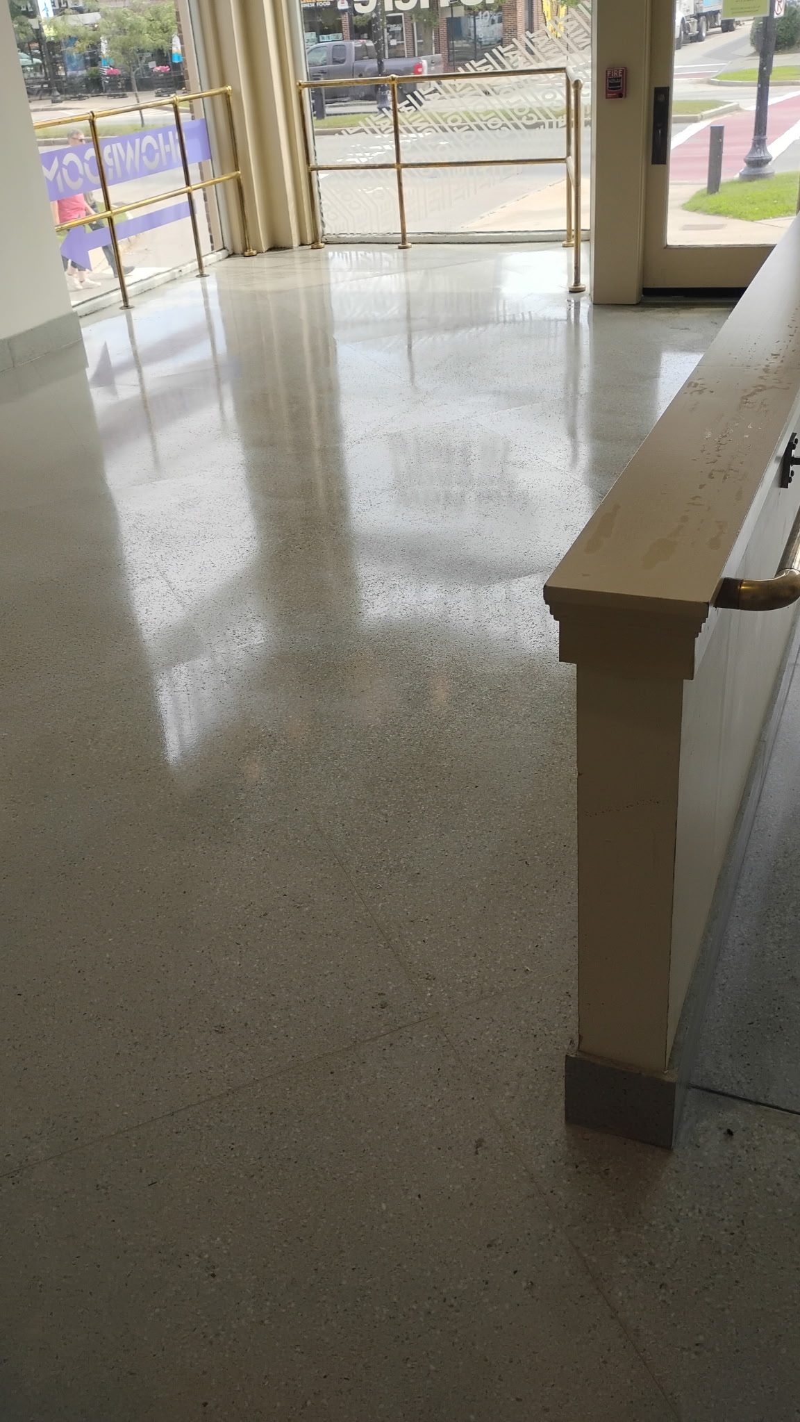 Polished terrazzo lobby floor after restoration